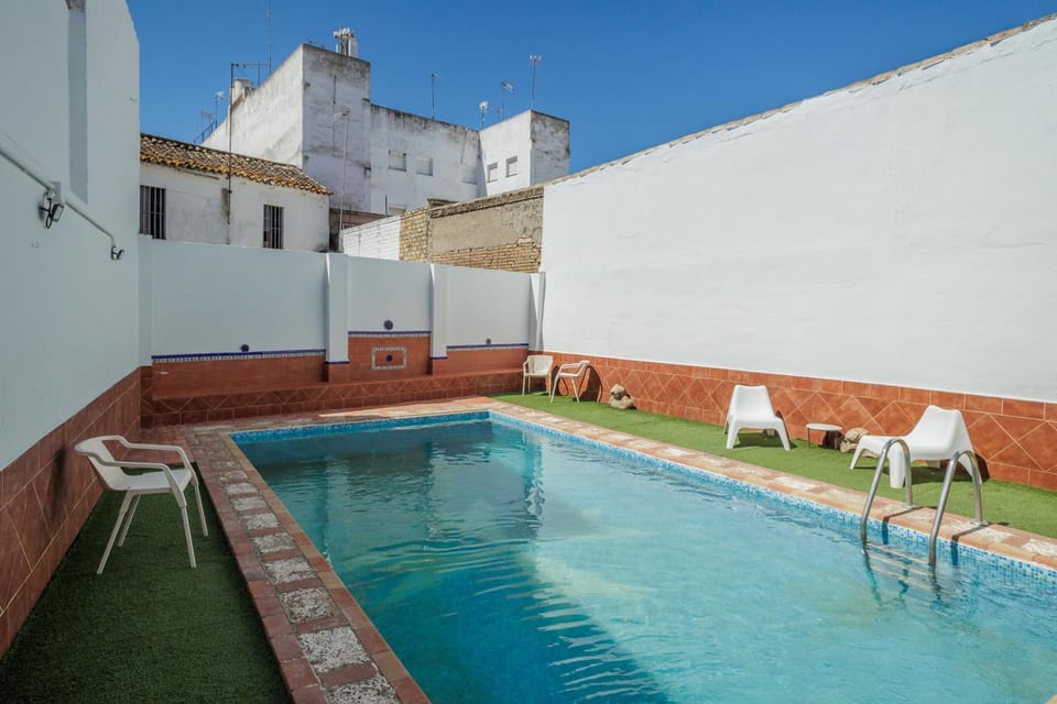 Property building, Living room, Swimming pool