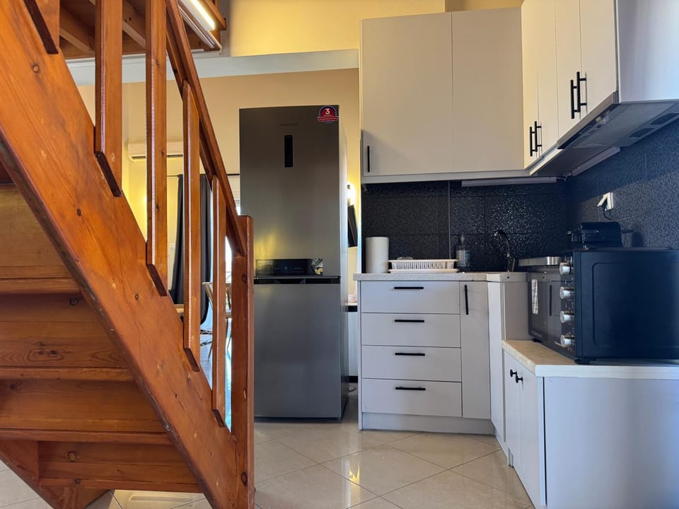 Kitchen or kitchenette, stove