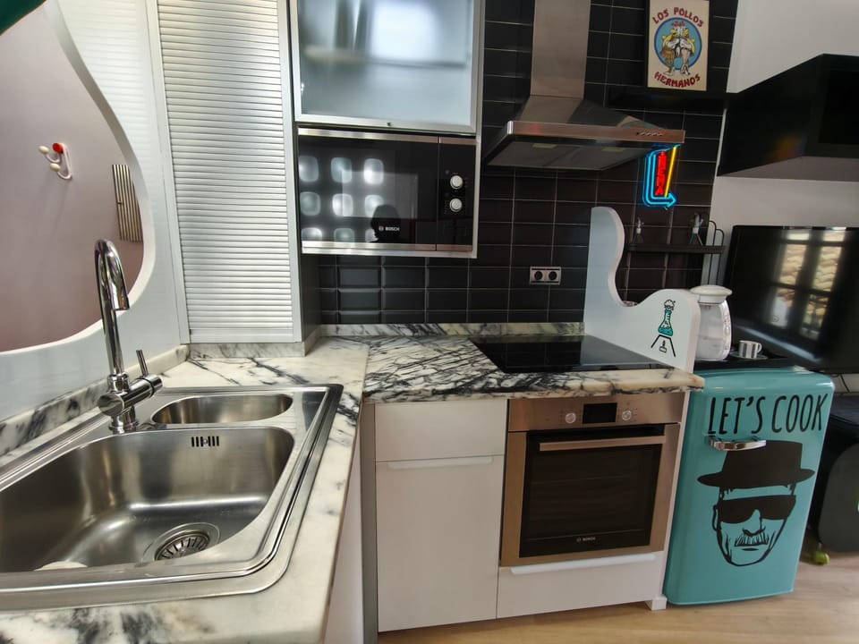 Kitchen or kitchenette, oven, stove