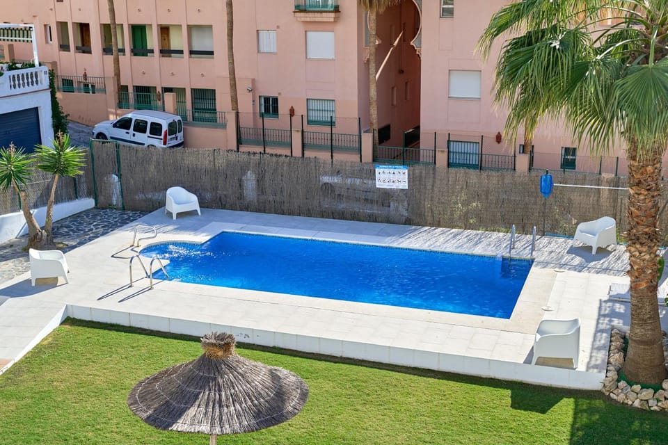 Property building, Living room, Swimming pool