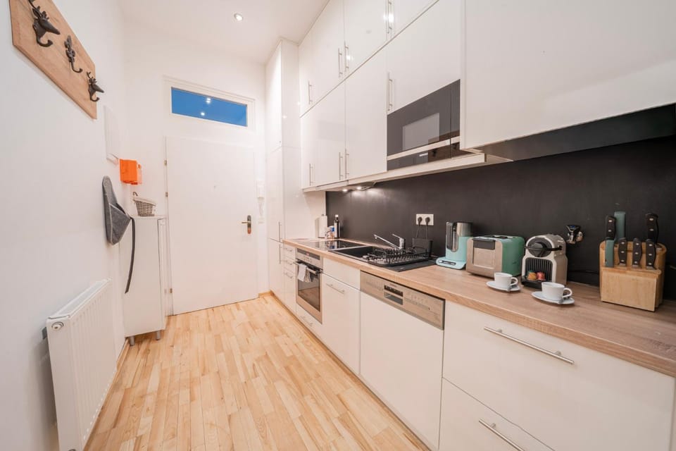 Kitchen or kitchenette, dishwasher, oven, stove, toaster