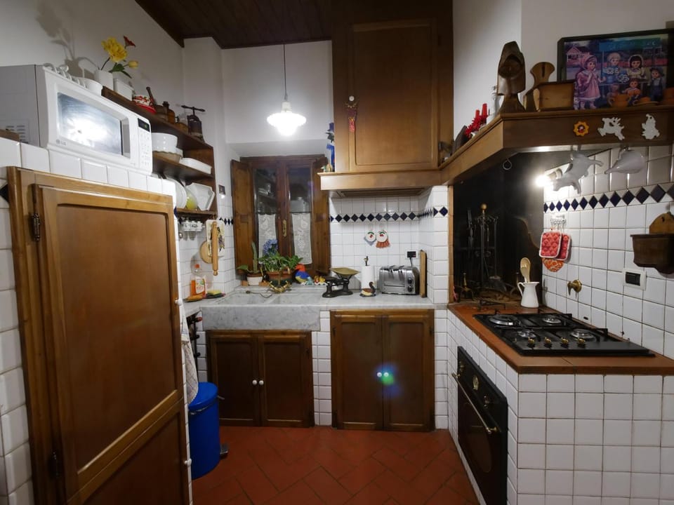 Kitchen or kitchenette, oven, stove
