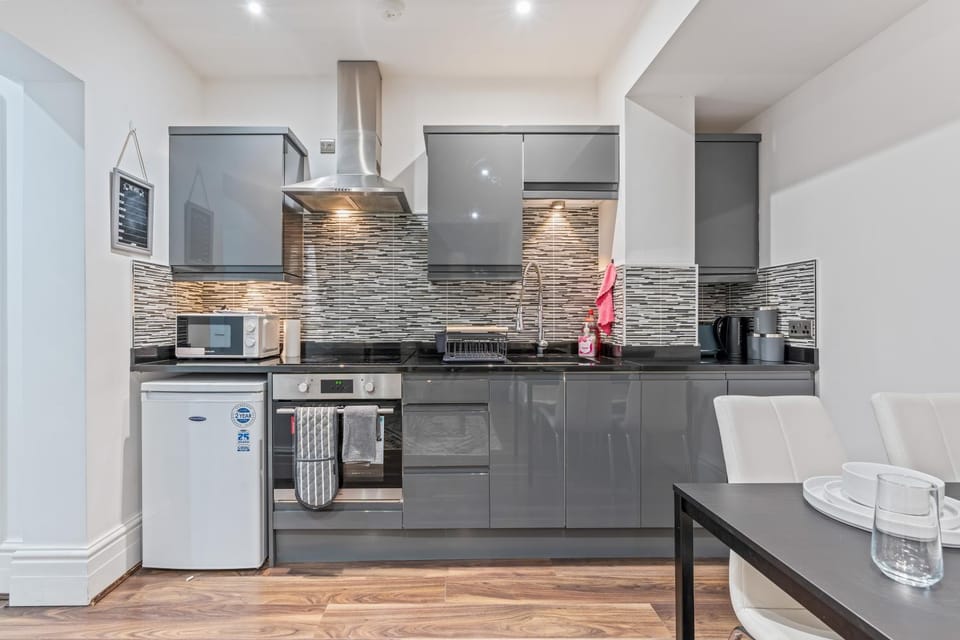 Kitchen or kitchenette, oven, stove, toaster