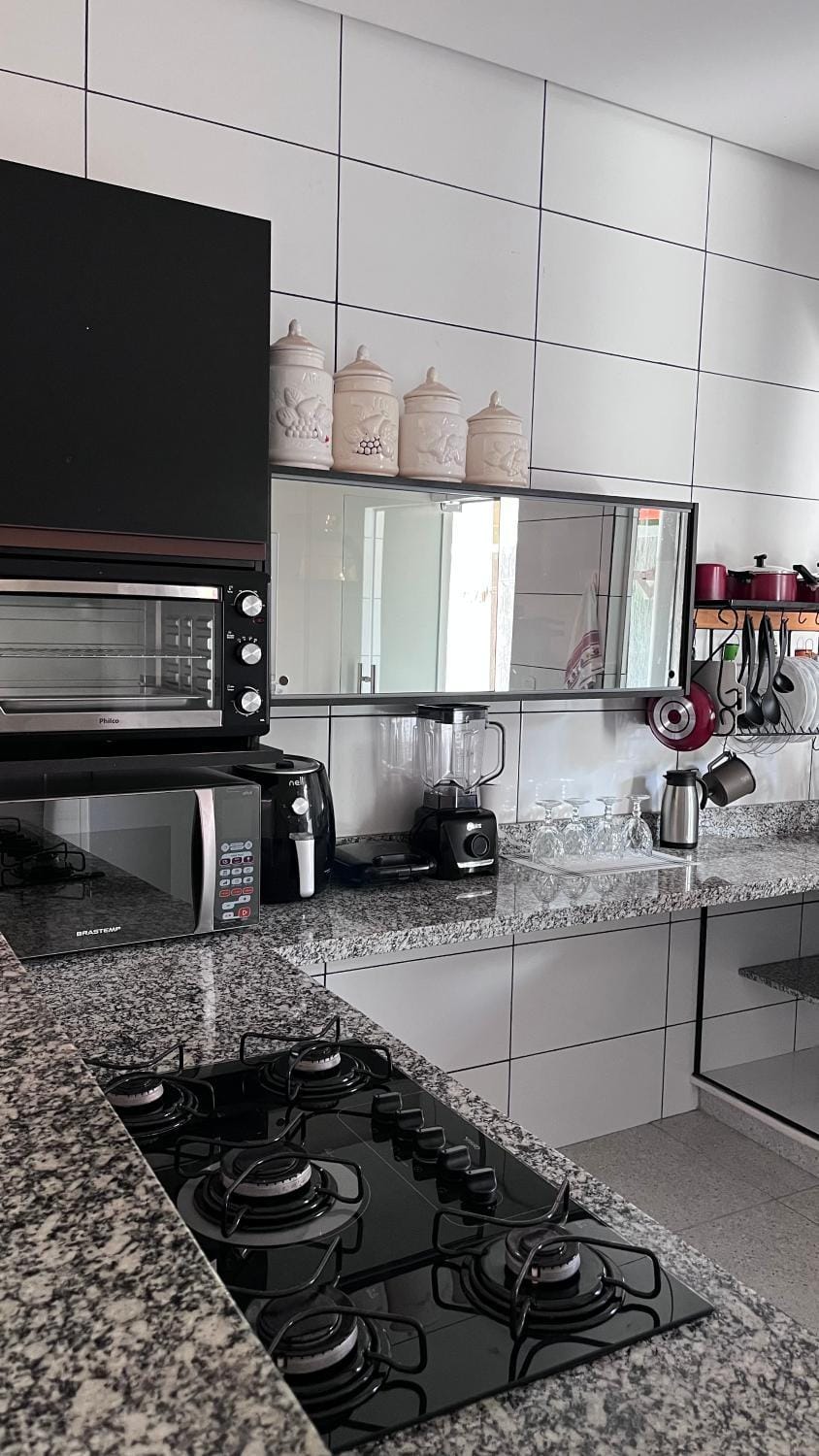 Kitchen or kitchenette, oven, stove