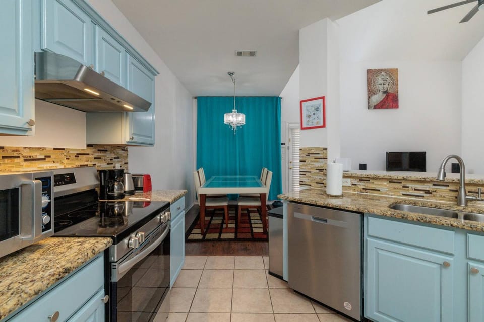 Kitchen or kitchenette, Seating area, Dining area, laundry, washing machine, dryer, kitchen