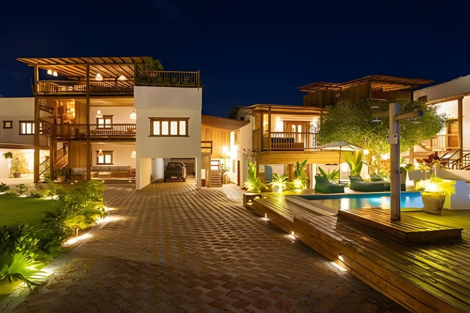 Property building, Patio, Night, Pool view, Swimming pool