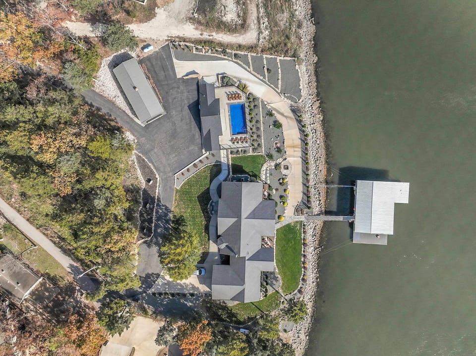 Lakefront Ozarks Home w Private Dock & Pool House in Lake of the Ozarks