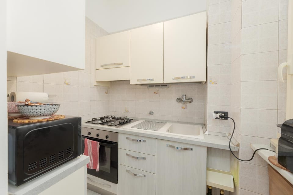 Kitchen or kitchenette, stove