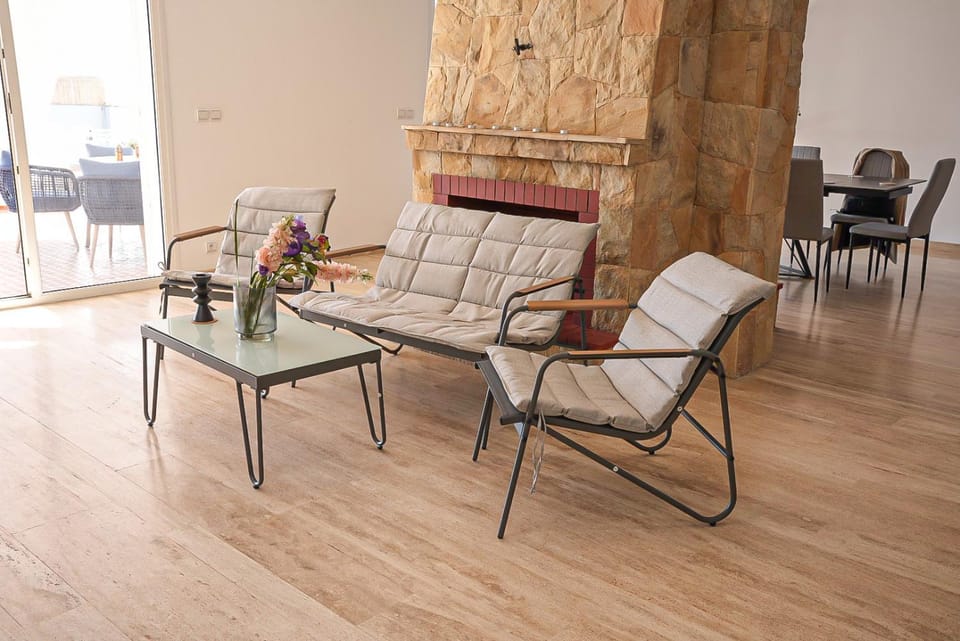 Property building, Living room, Seating area, Swimming pool