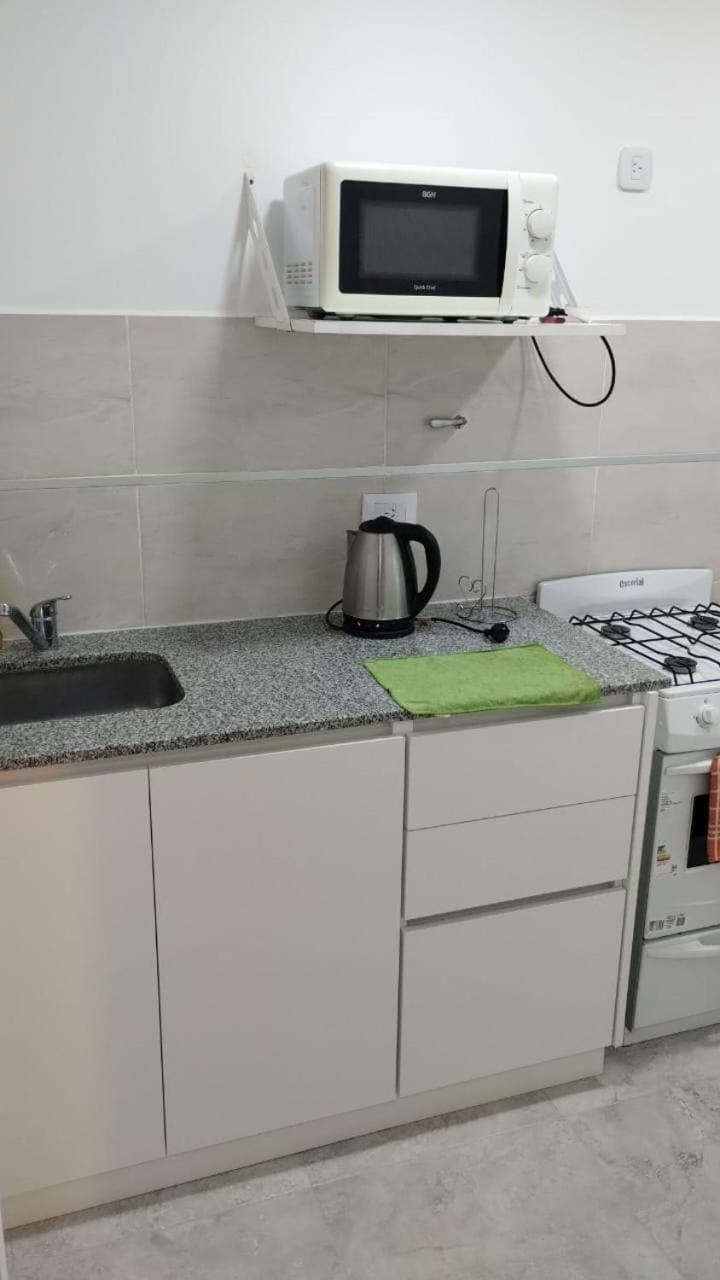 Kitchen or kitchenette, stove
