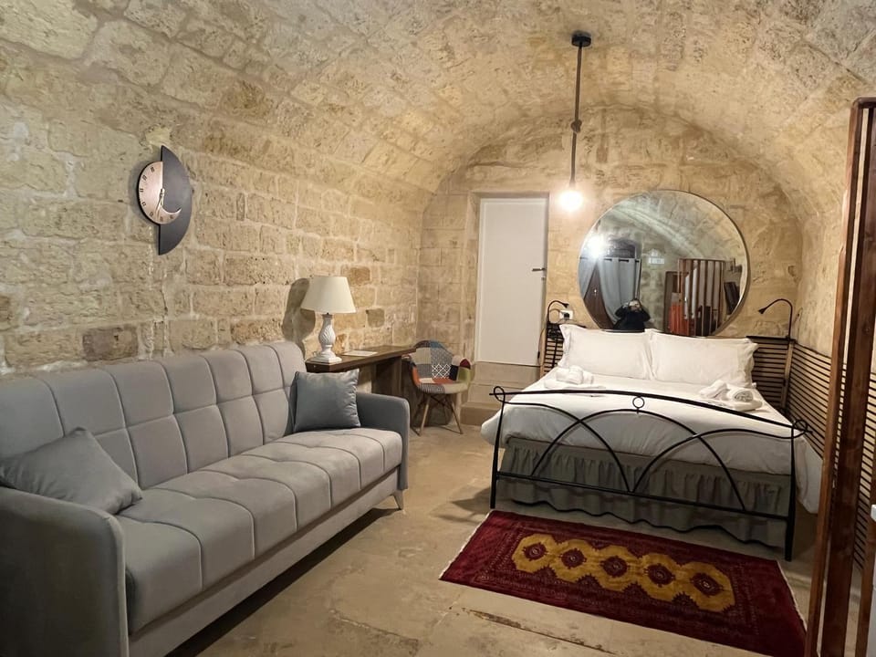 Bed, Living room, Seating area, Bedroom