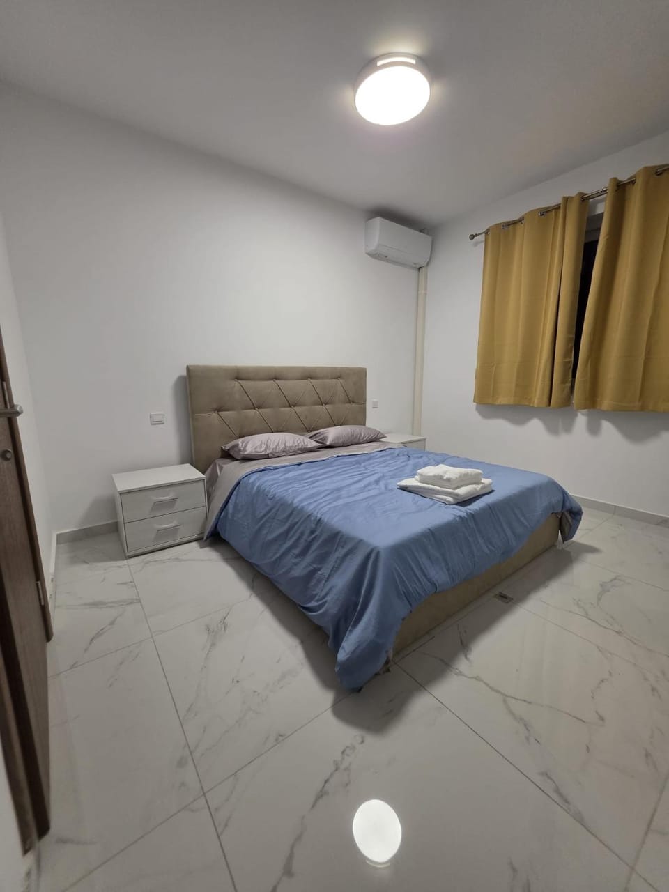 Bedroom, towels, wardrobe, air conditioner