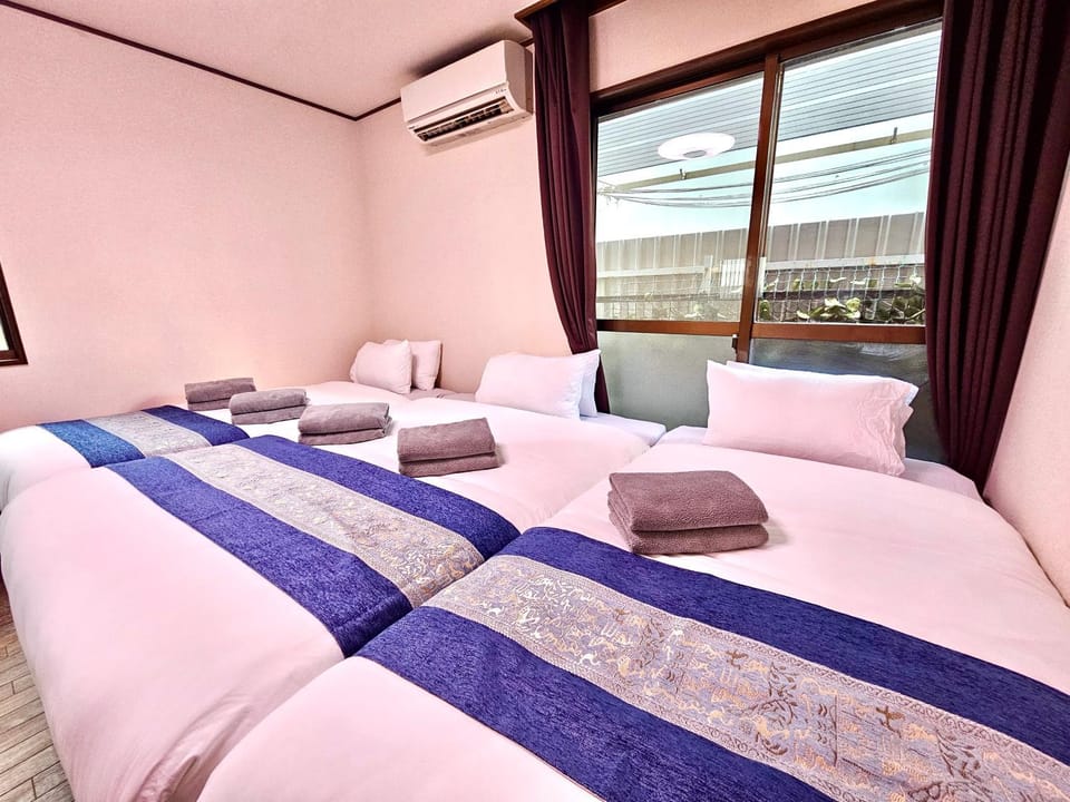 Bed, Photo of the whole room, Bedroom, towels, air conditioner