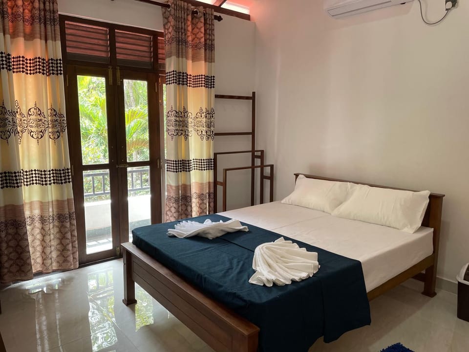 Bed, Photo of the whole room, Bedroom, towels, air conditioner