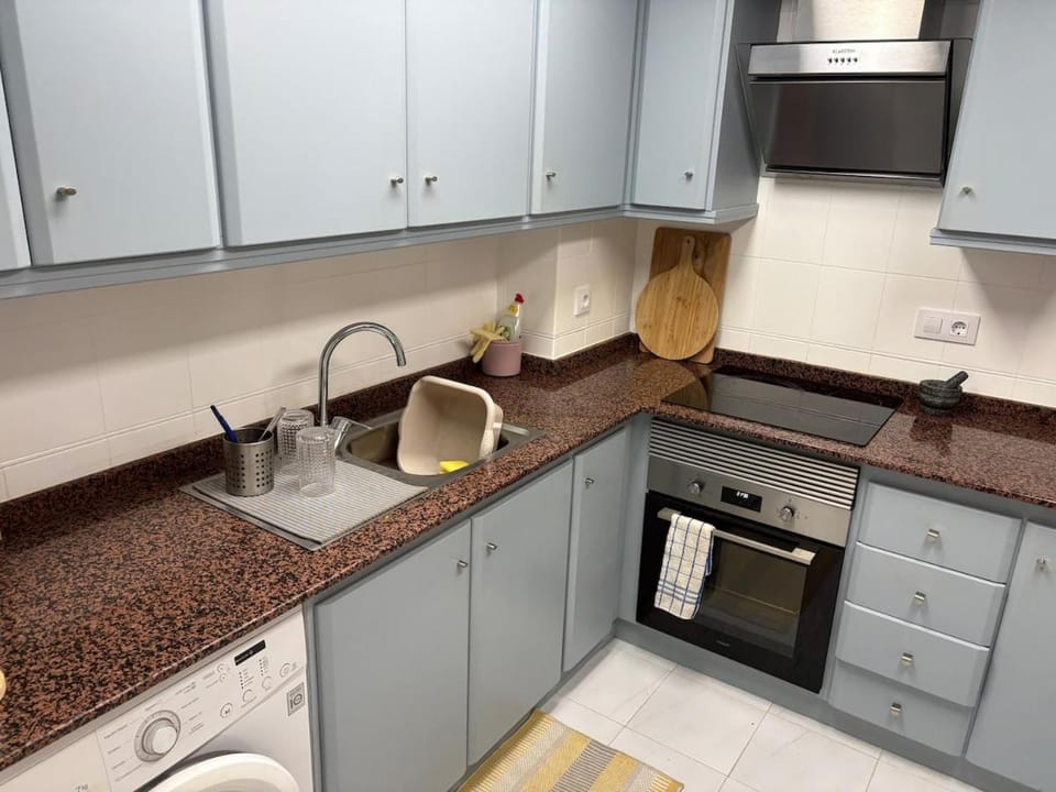 Kitchen or kitchenette, oven, stove