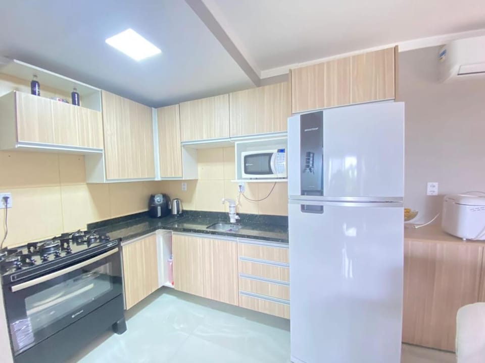 Apartamento completo, 2 quartos com suite e garagem, 15 minutos do aeroporto Apartment in State of Rio Grande do Sul