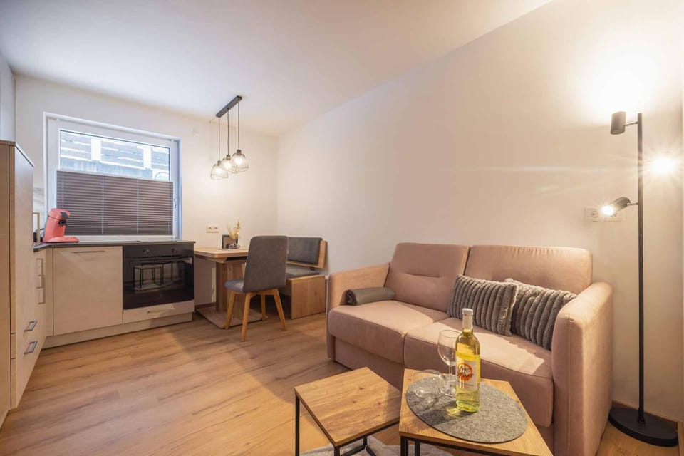 Kitchen or kitchenette, Living room, Seating area, Dining area