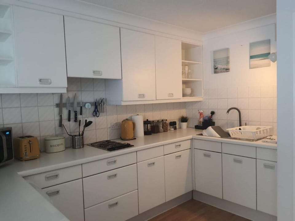 Kitchen or kitchenette, stove, toaster