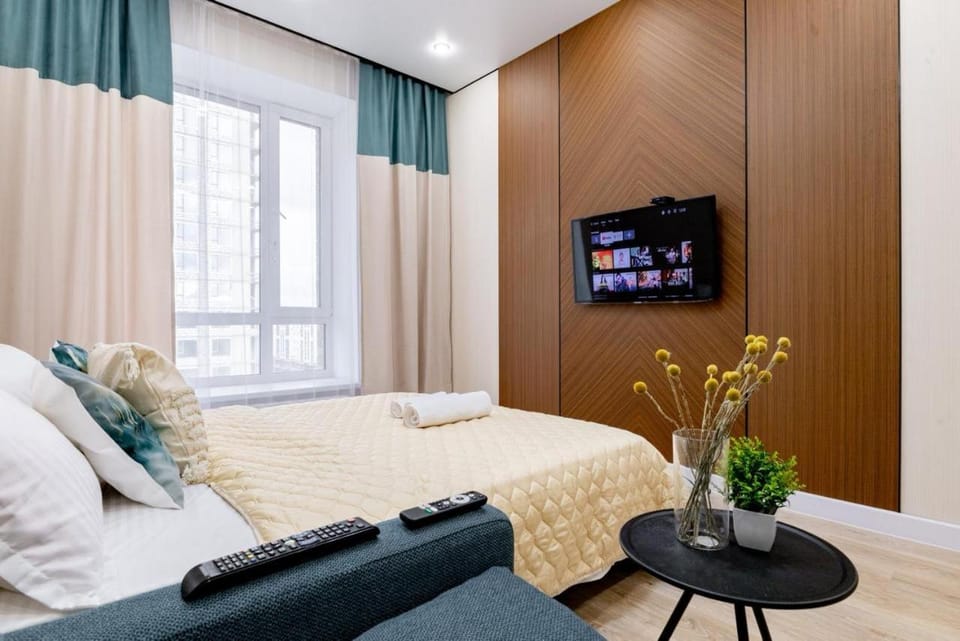 Communal lounge/ TV room, Bed, TV and multimedia, Living room, Photo of the whole room, Seating area, Evening entertainment, Bedroom