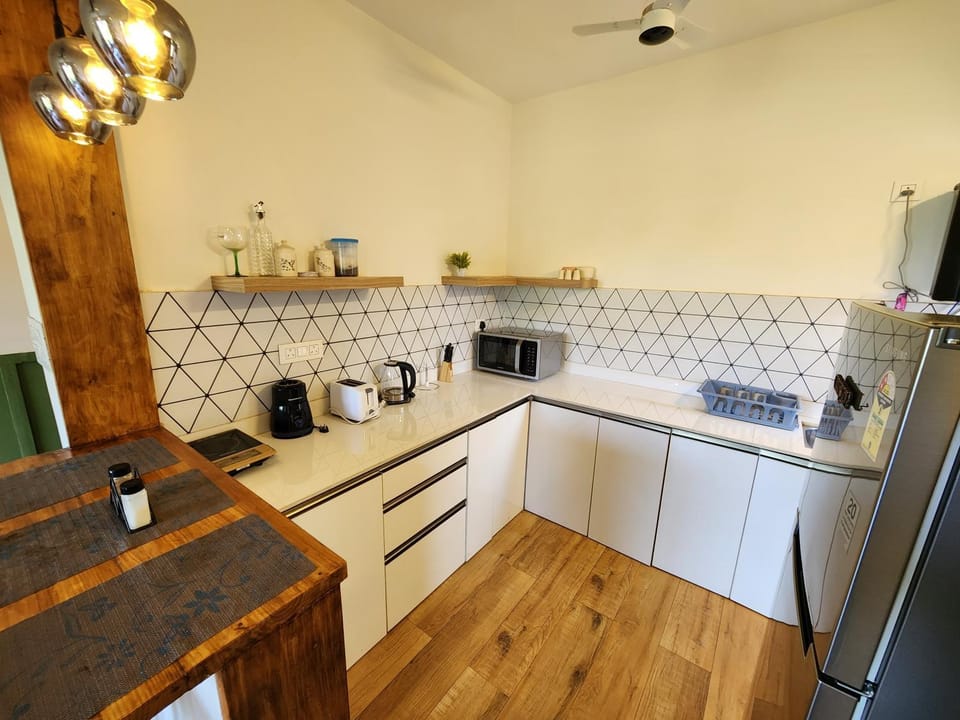 Kitchen or kitchenette, oven, stove, toaster