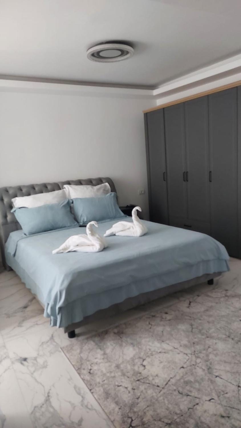 Bed, Photo of the whole room, Bedroom, towels, wardrobe