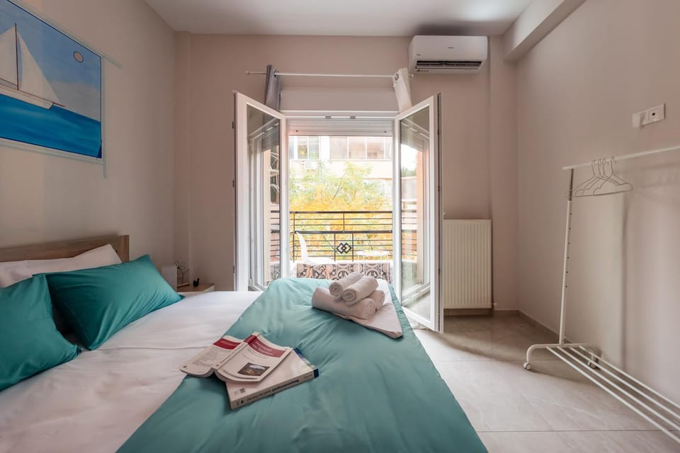 Bed, Photo of the whole room, Bedroom, towels, air conditioner