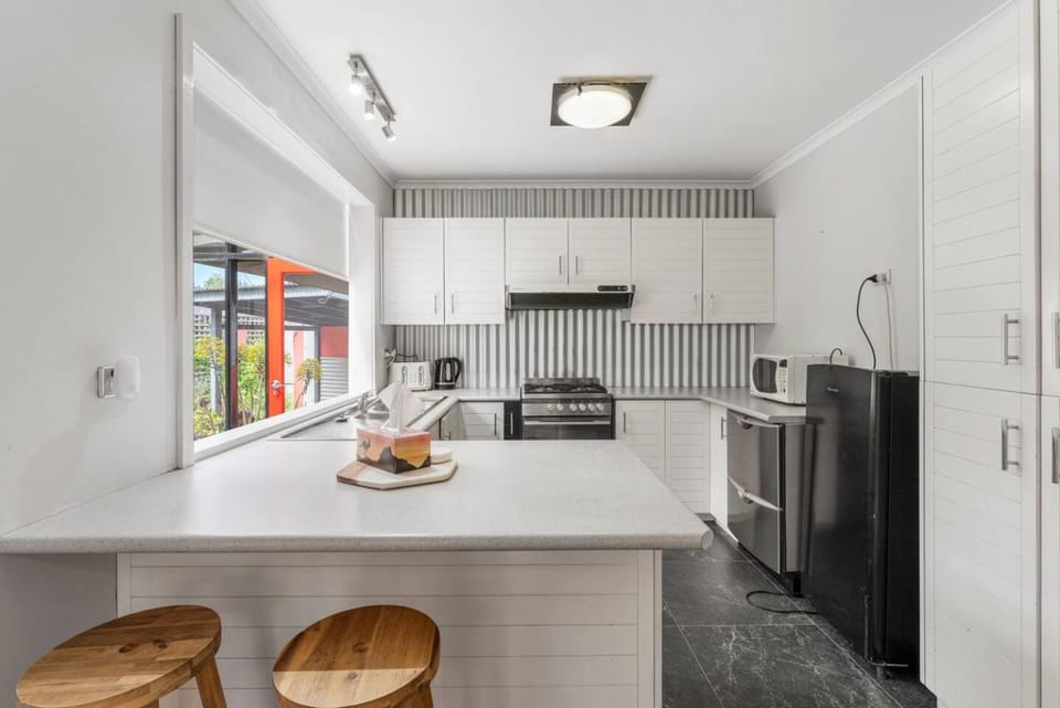 Kitchen or kitchenette, oven, stove, toaster