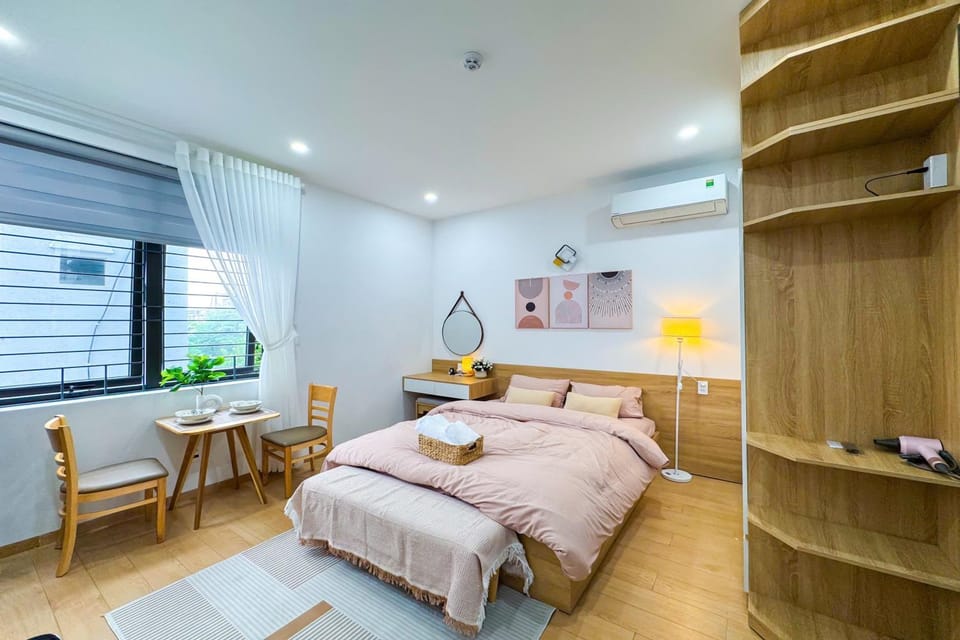 Bed, Photo of the whole room, Seating area, Bedroom, hair dryier, towels, air conditioner