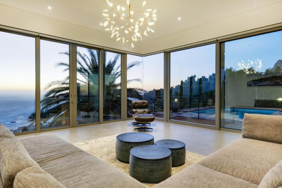View (from property/room), Balcony/Terrace, Living room, Seating area, Pool view, Sea view