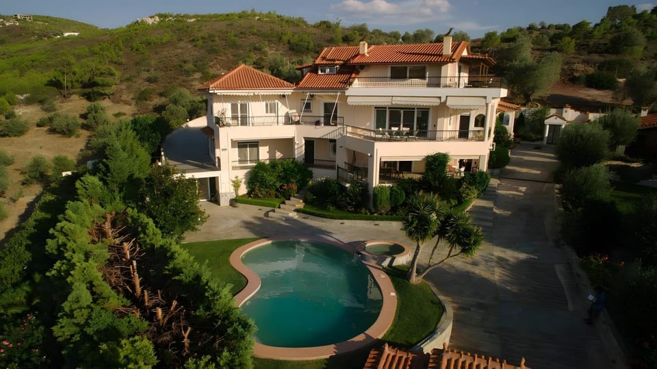 Property building, Living room, Swimming pool