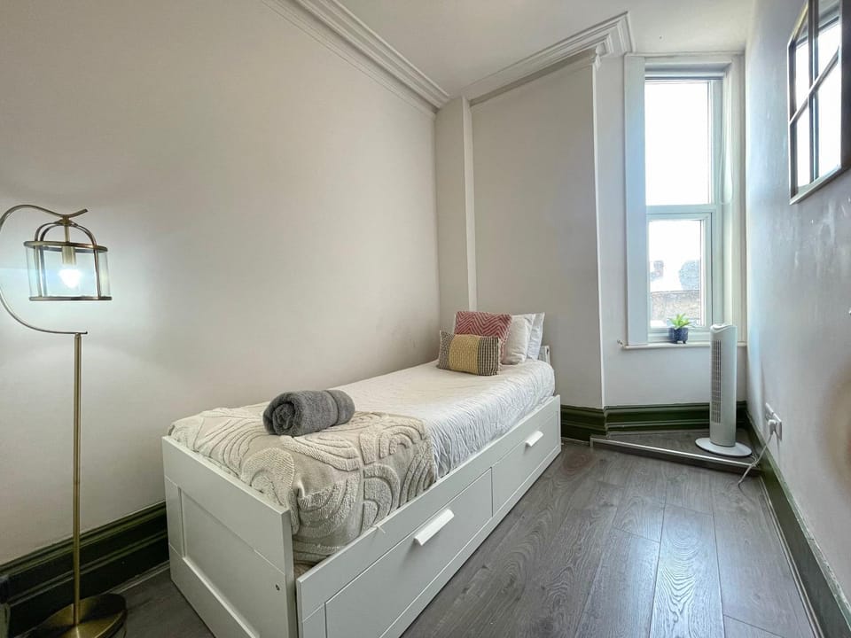 Bed, Bedroom, hair dryier, heating, storage, towels, wardrobe