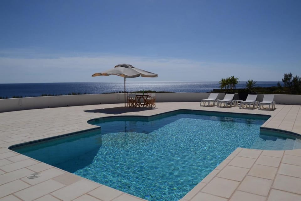 Property building, Living room, Swimming pool