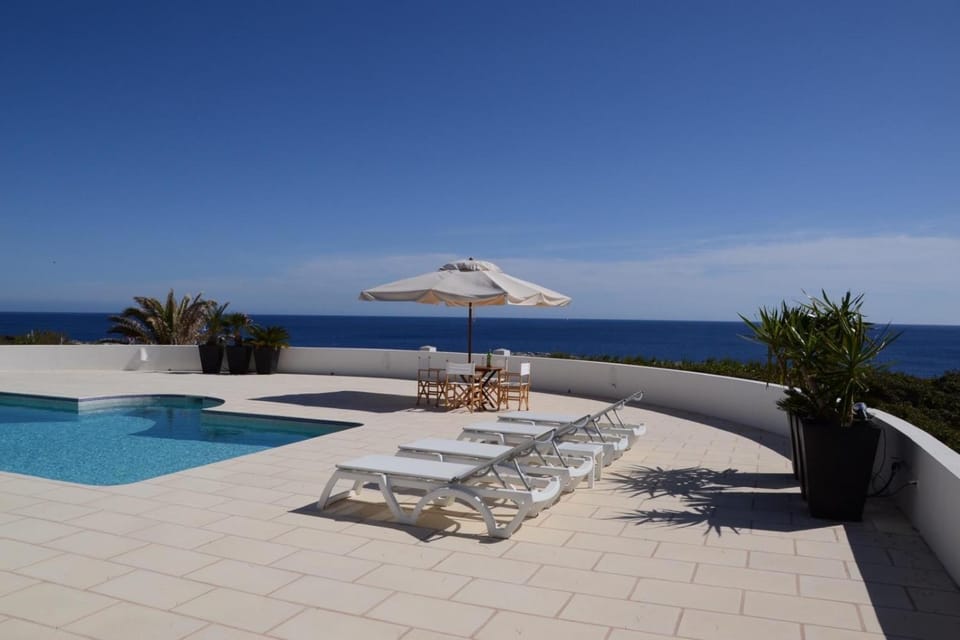 Property building, Living room, Swimming pool