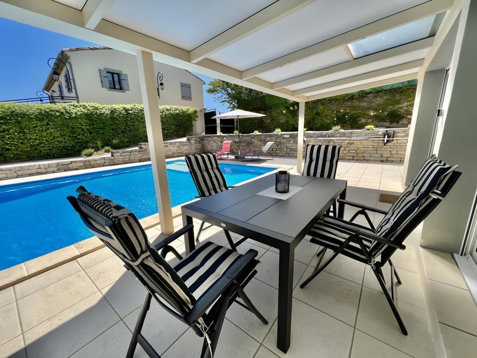 Property building, Living room, Swimming pool