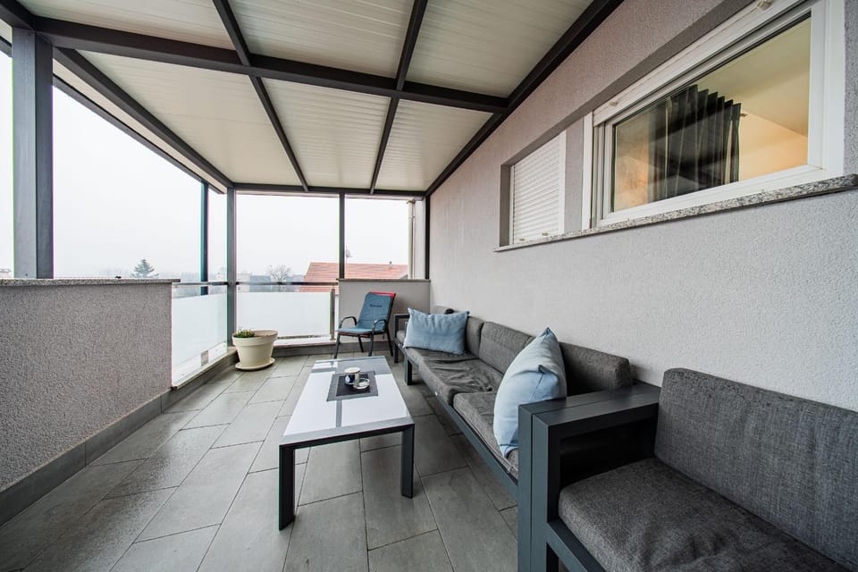 Property building, View (from property/room), Balcony/Terrace, Balcony/Terrace, Living room, Seating area