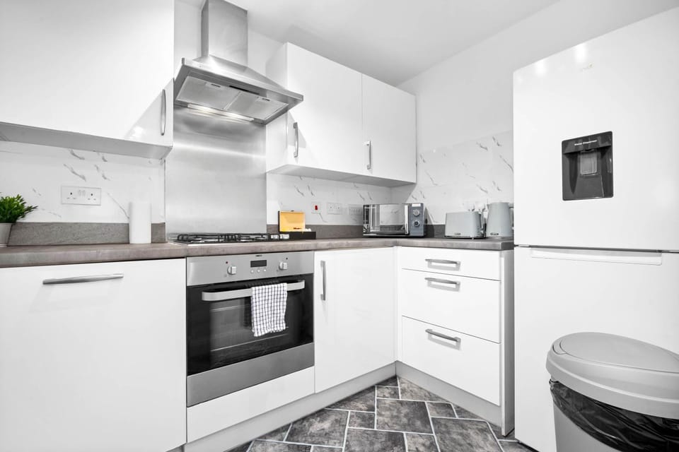 Kitchen or kitchenette, oven, stove, toaster