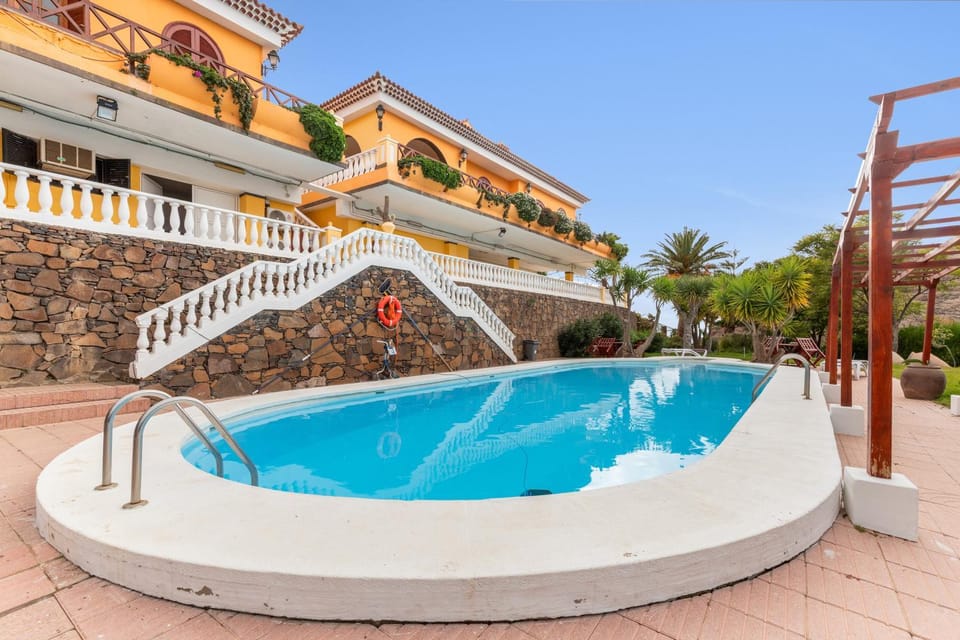 Property building, Living room, Swimming pool