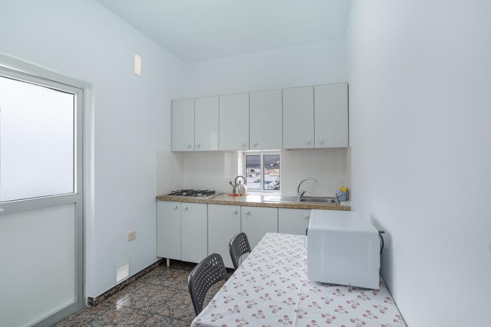 Property building, Kitchen or kitchenette, Living room