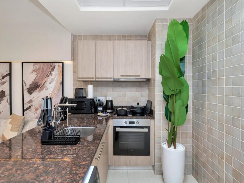 Coffee/tea facilities, Kitchen or kitchenette, stove, toaster