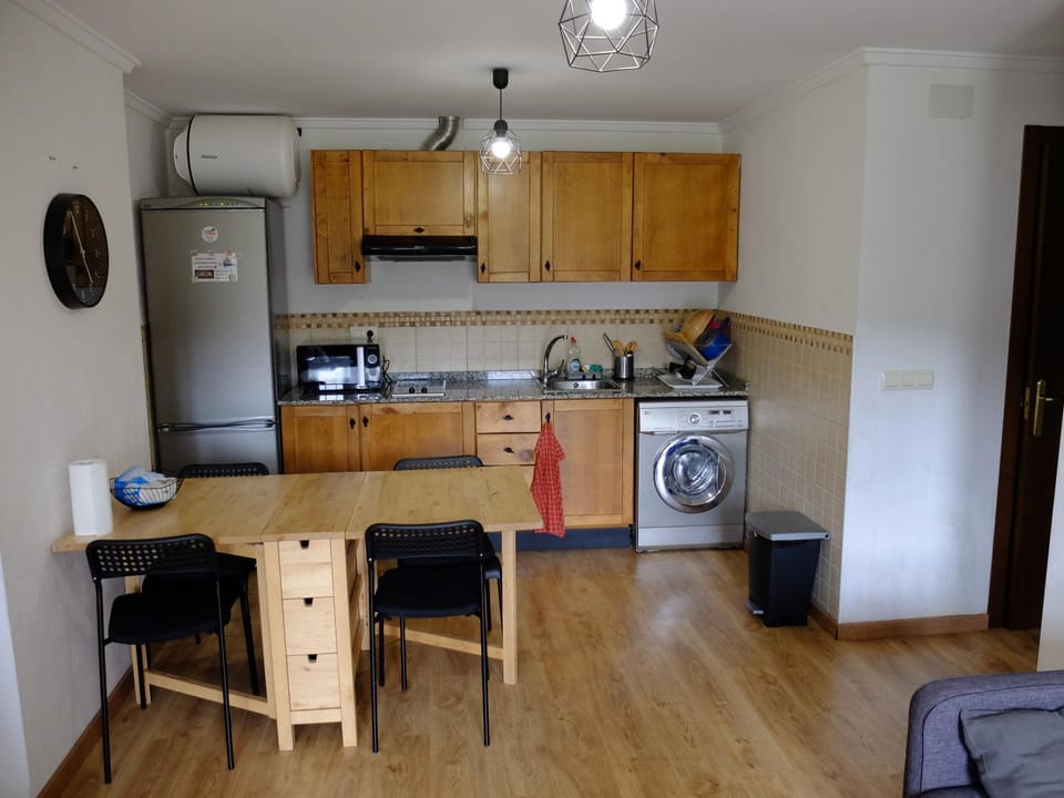 Kitchen or kitchenette, Dining area, microwave, toaster, washing machine, dryer