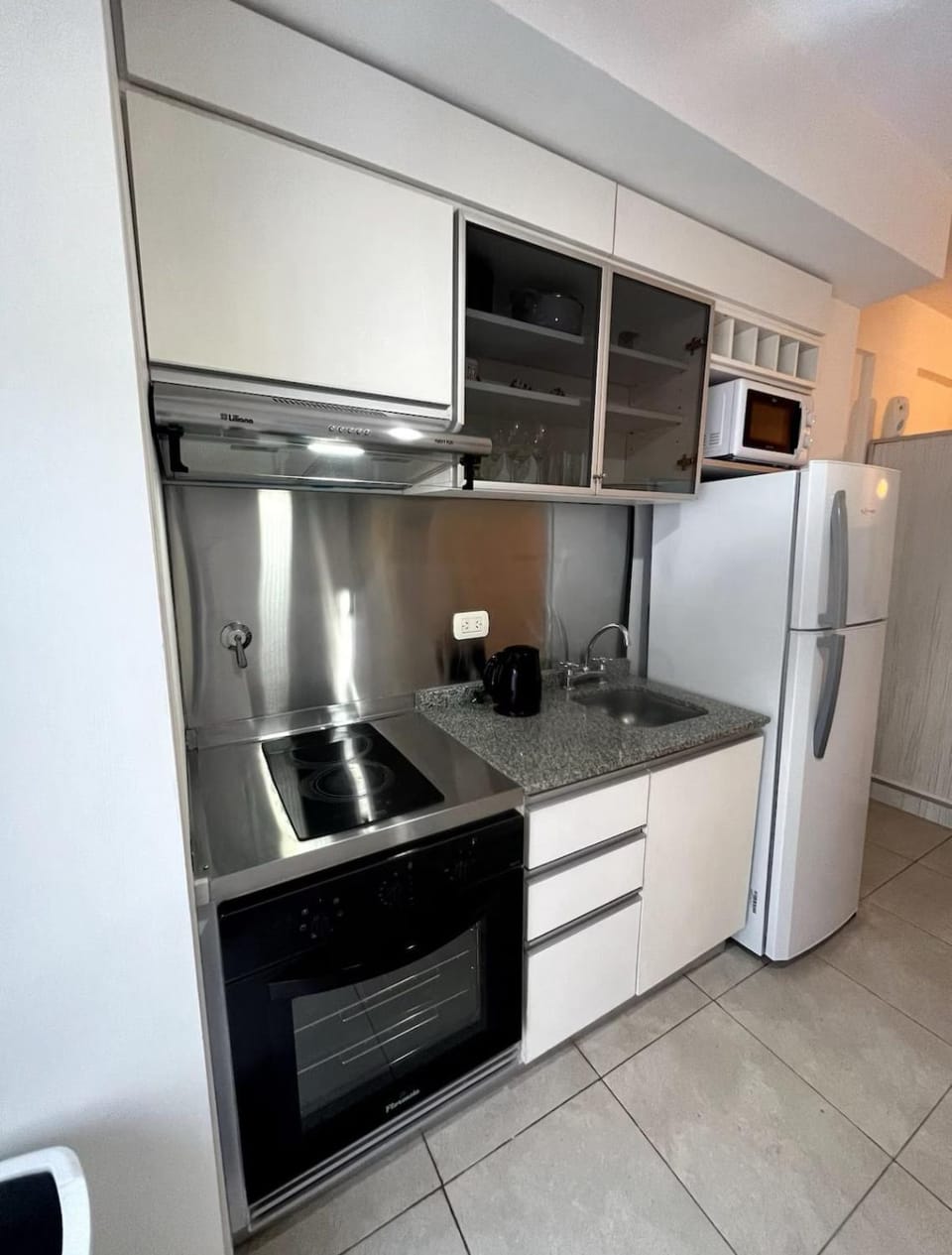 Kitchen or kitchenette, oven, stove