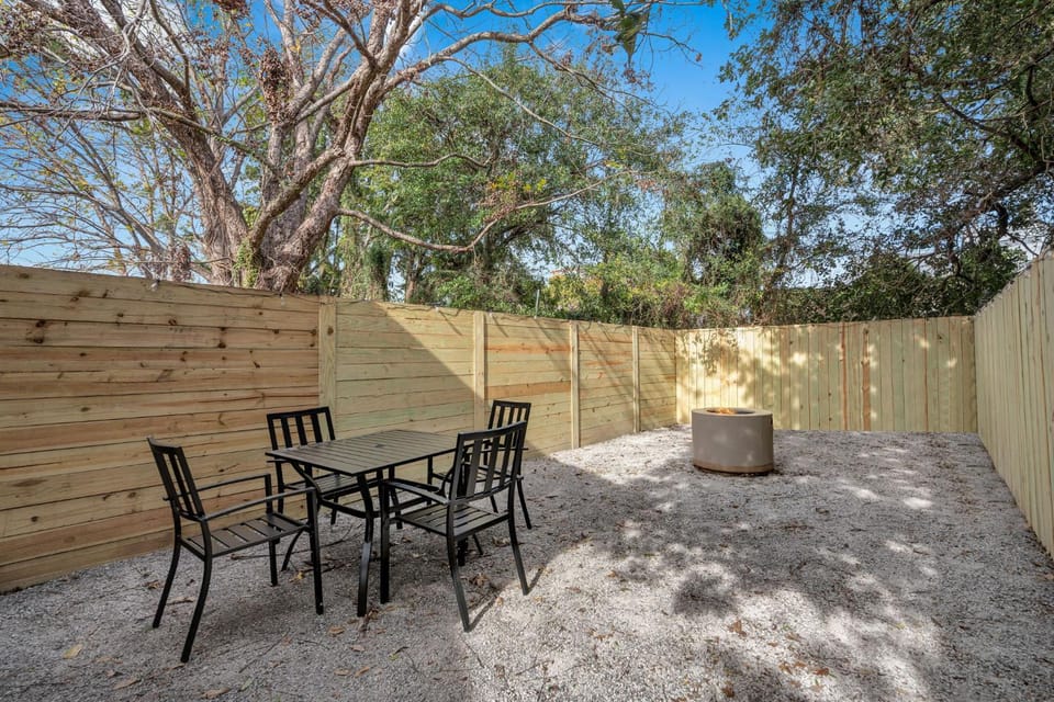 Fire pit & shotgun charm near City Park House in New Orleans