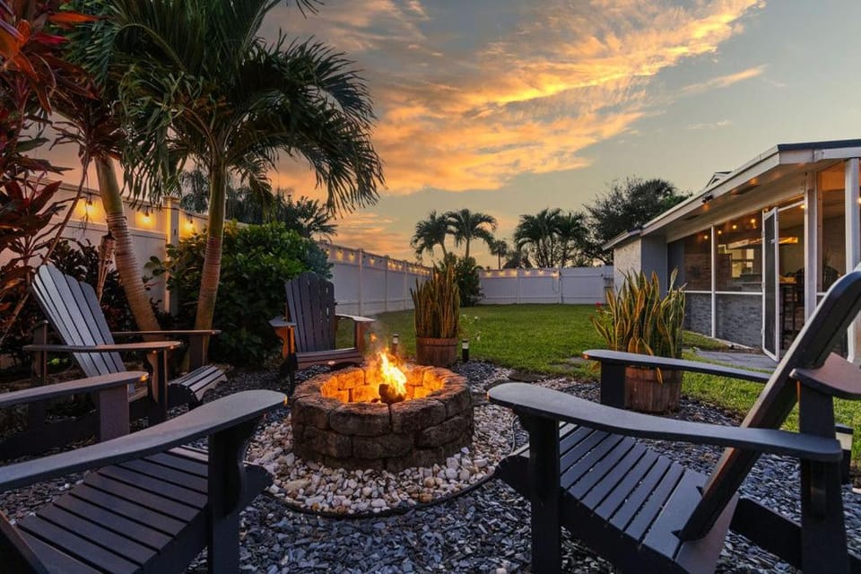 Heated PoolFire PitOutdoor KitchenCorn Hole House in Palm Beach Gardens