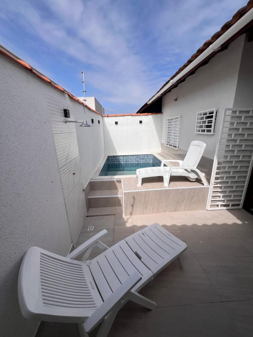 Patio, Day, Natural landscape, Pool view, Swimming pool, sunbed