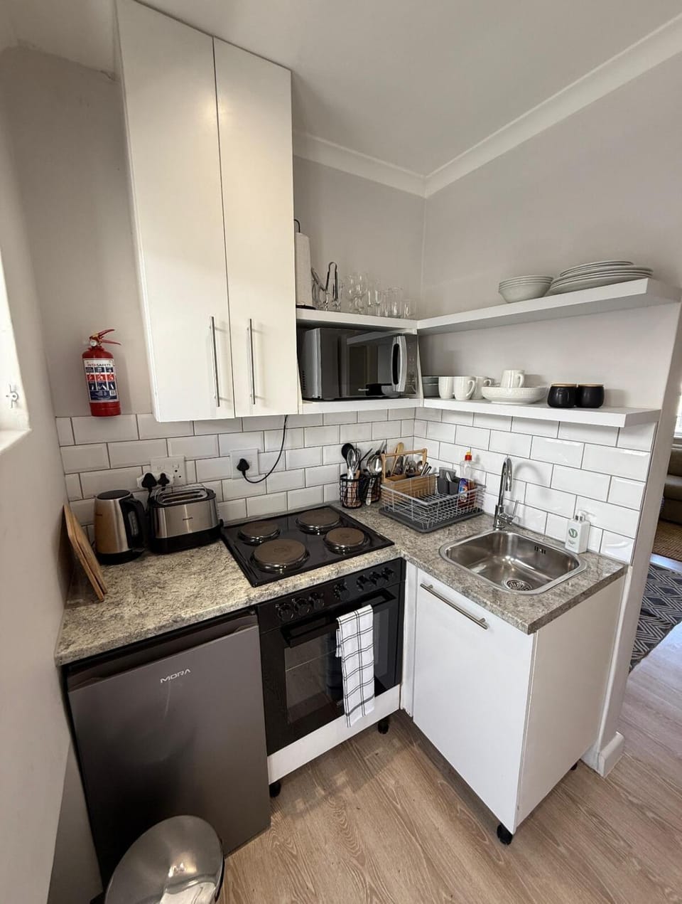 Kitchen or kitchenette, stove, toaster