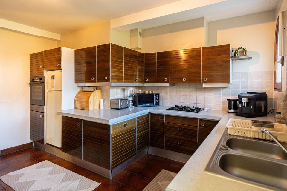 Kitchen or kitchenette, stove