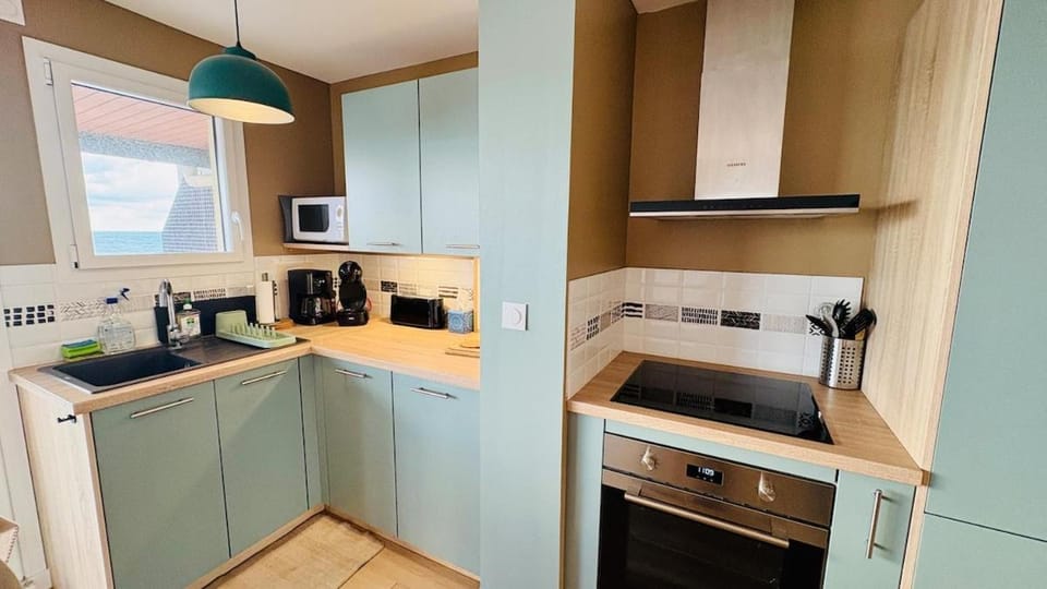 Kitchen or kitchenette, dishwasher, oven, stove, toaster