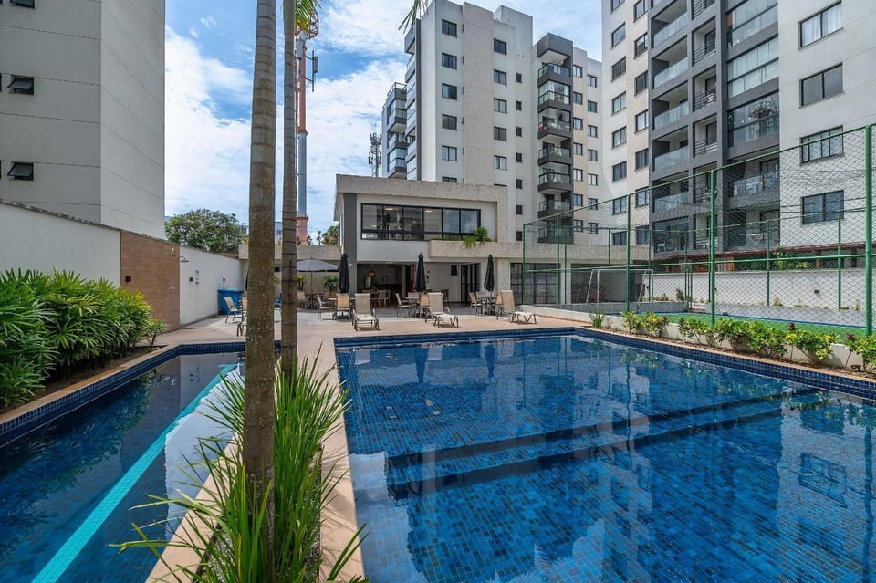 Property building, Day, Pool view, Swimming pool, sunbed
