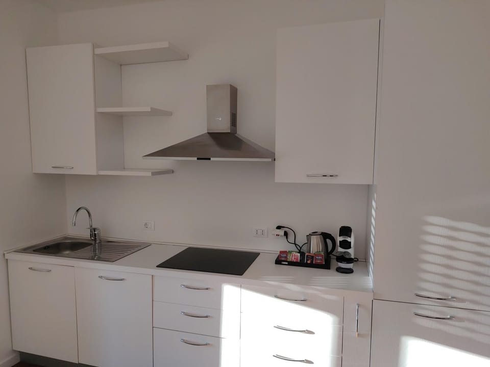 Kitchen or kitchenette, stove