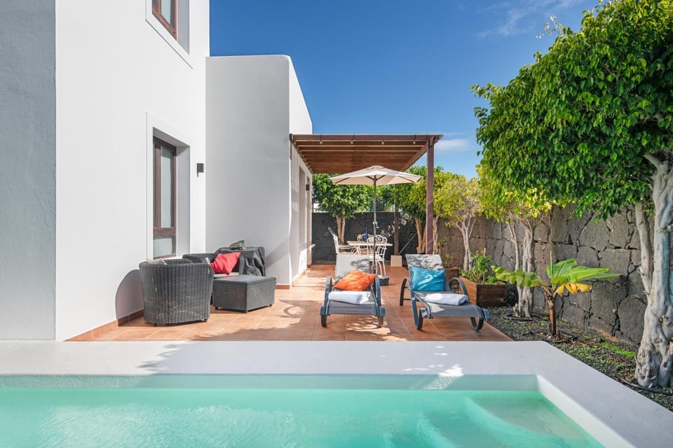 Property building, Living room, Swimming pool
